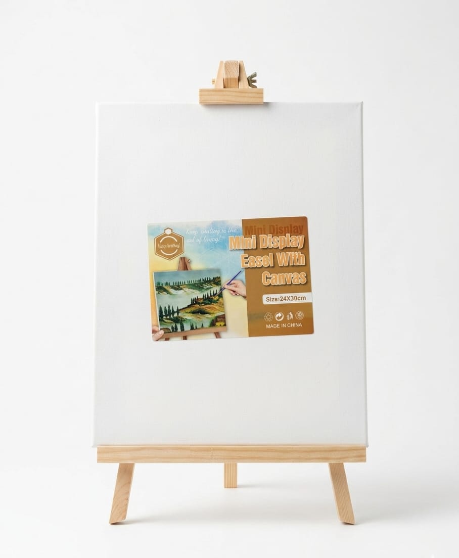 Mini Chevalet de Table en Bois Naturel avec Toile à Peindre 24x30cm Mini chevalet d'exposition en bois clair supportant une toile blanche vierge de format 24x30 cm, avec une étiquette de présentation illustrée.